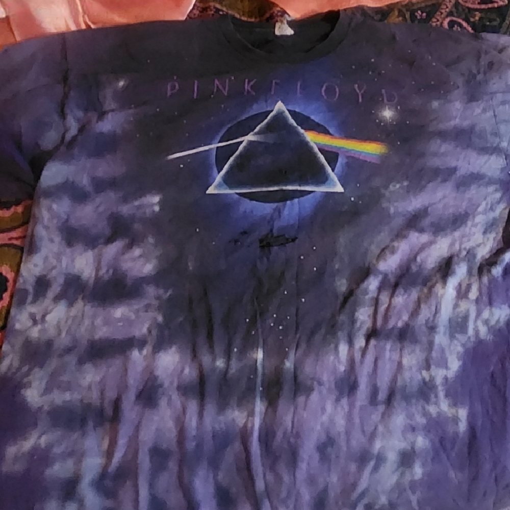 Vintage and well worn pink Floyd tie dye